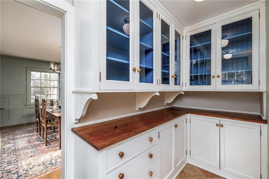 604 Pine Road Sewickley, PA 15143 - Photo 8 of 24 a view of an empty room with wooden floor and staircase