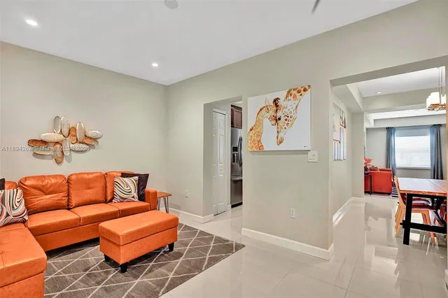 a blue room with blue walls and a couch