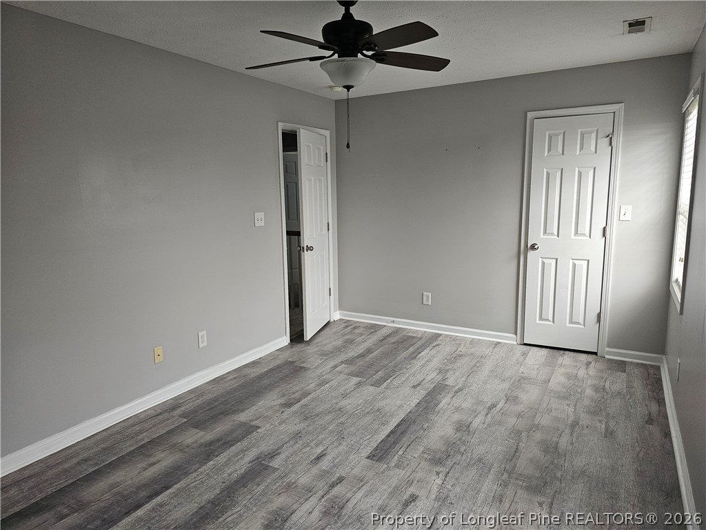 5708 Spreading Branch Road Hope Mills, NC 28348 - Photo 12 of 21 a view of an empty room with a window