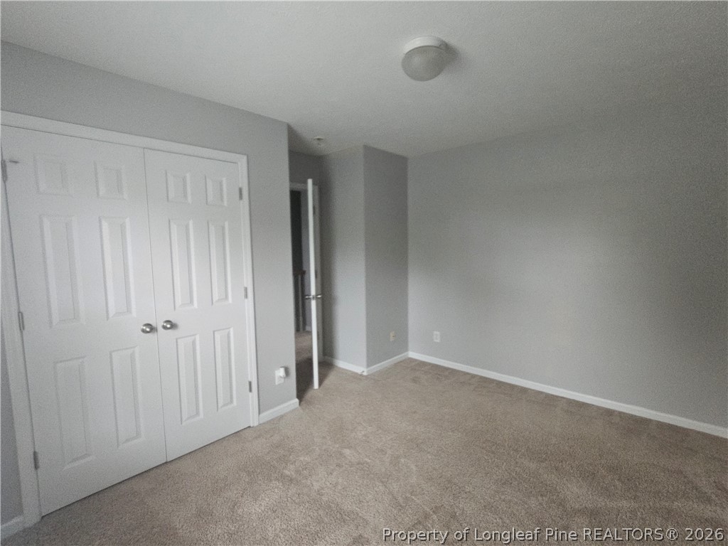 5708 Spreading Branch Road Hope Mills, NC 28348 - Photo 14 of 21 a view of an empty room and closet area