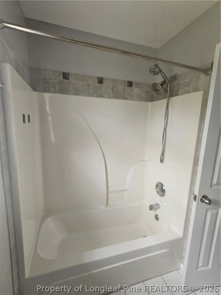 5708 Spreading Branch Road Hope Mills, NC 28348 - Photo 16 of 21 a close view of a bathtub in bathroom
