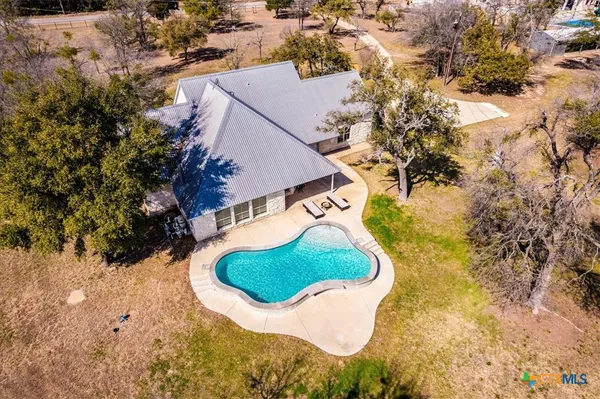 an aerial view of a swimming pool