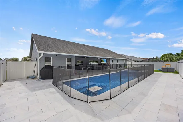 a view of backyard with furniture