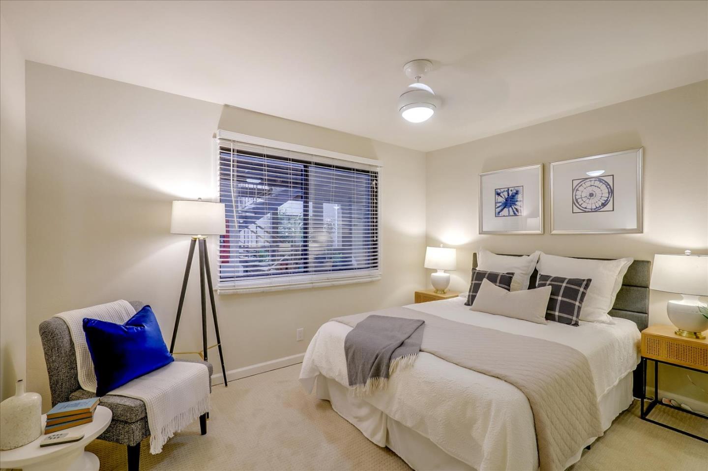 7 Embarcadero West, Unit 115 Oakland, CA 94607 - Photo 13 of 39 a bedroom with a bed and wooden floor