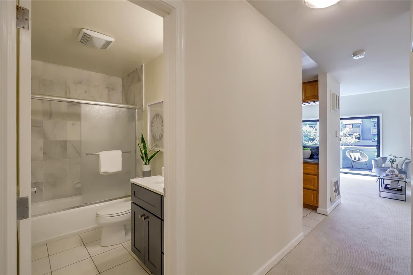 7 Embarcadero West, Unit 115 Oakland, CA 94607 - Photo 16 of 39 a bathroom with a bathtub and a shower