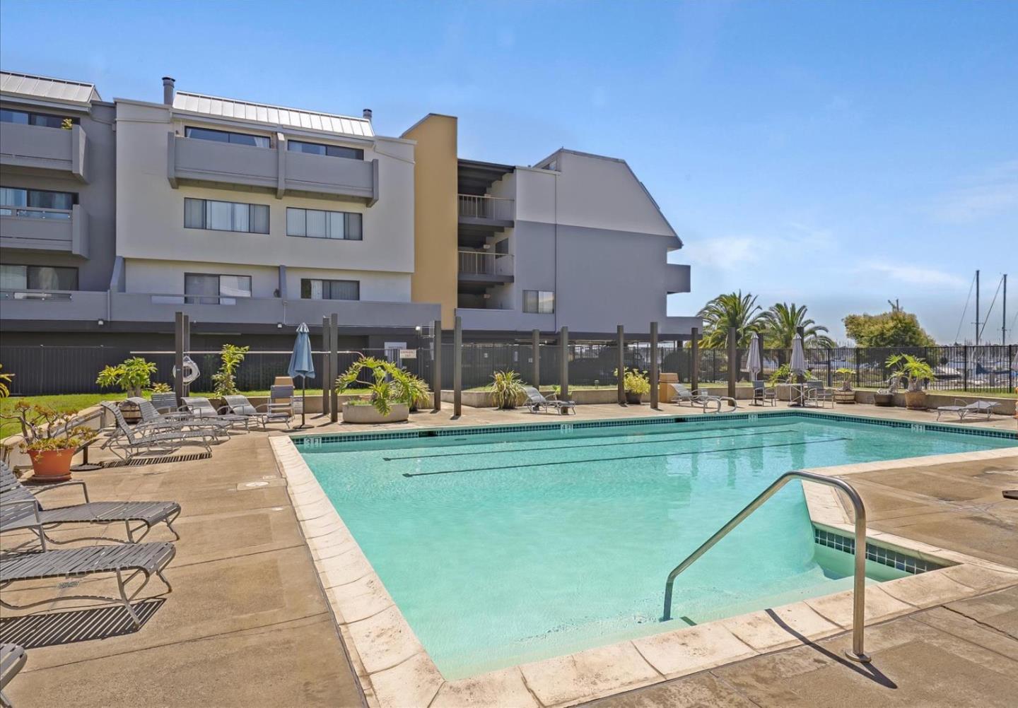 7 Embarcadero West, Unit 115 Oakland, CA 94607 - Photo 28 of 39 a view of swimming pool with outdoor seating