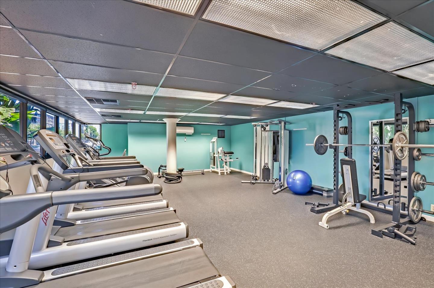 7 Embarcadero West, Unit 115 Oakland, CA 94607 - Photo 30 of 39 a view of a room with gym equipment