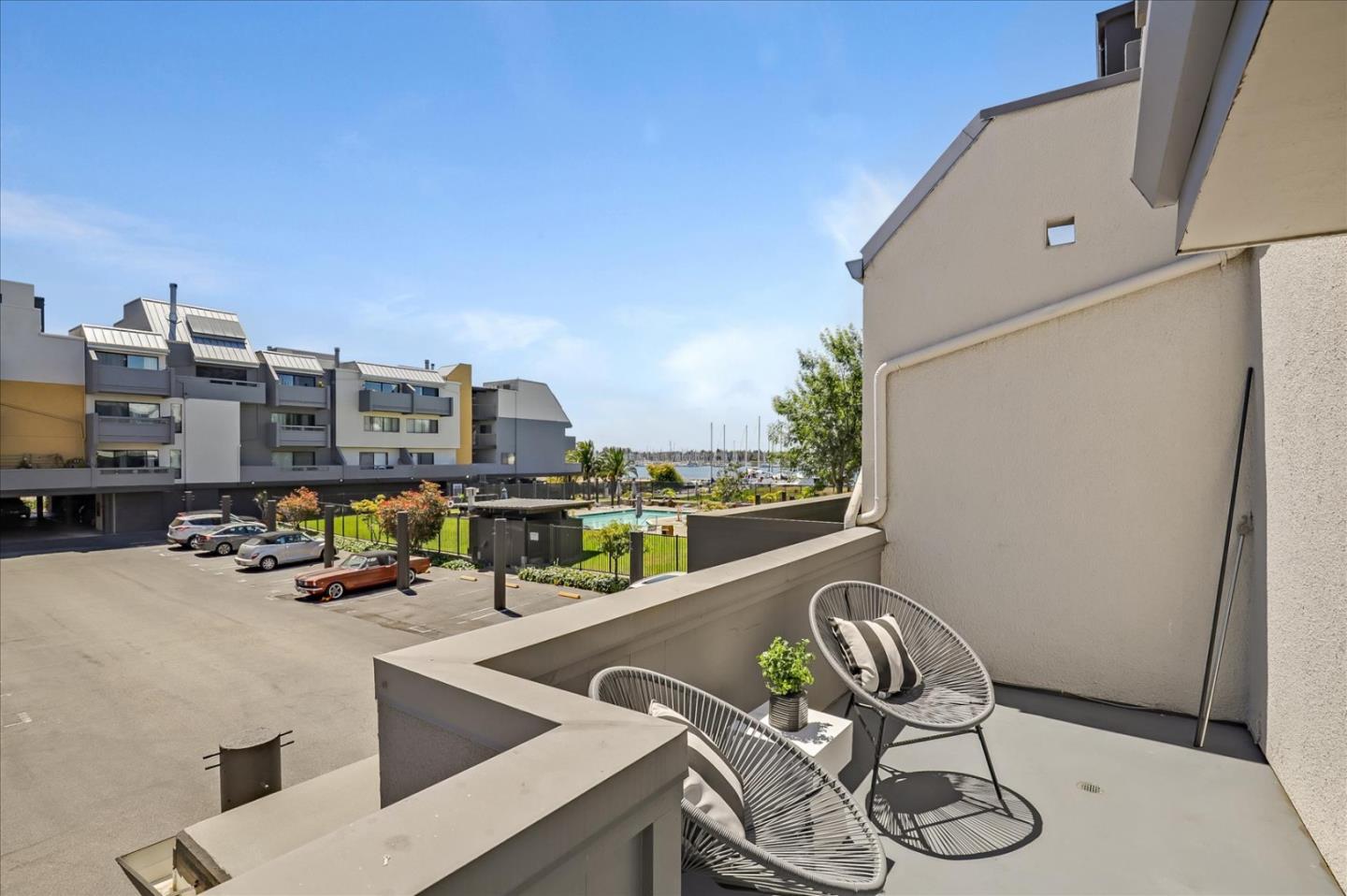 7 Embarcadero West, Unit 115 Oakland, CA 94607 - Photo 5 of 39 a view of swimming pool with outdoor seating