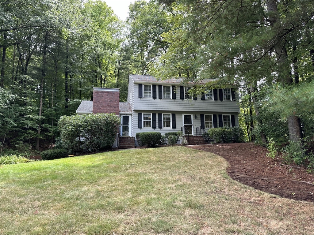 76 Brook Trail Road Concord, MA 01742 - Photo 1 of 1 a front view of a house with a yard