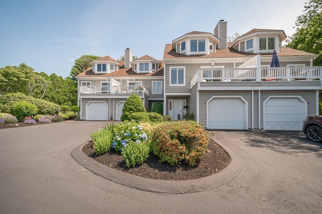 3 Raven Lane, Unit A2 Gloucester, MA 01930 - Photo 28 of 39 a front view of a house with a yard