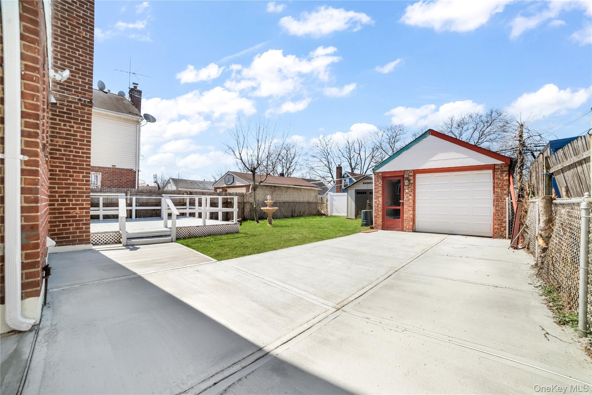 81-28 252nd Street Queens, NY 11426 - Photo 19 of 21 a view of outdoor space yard and front view of a house