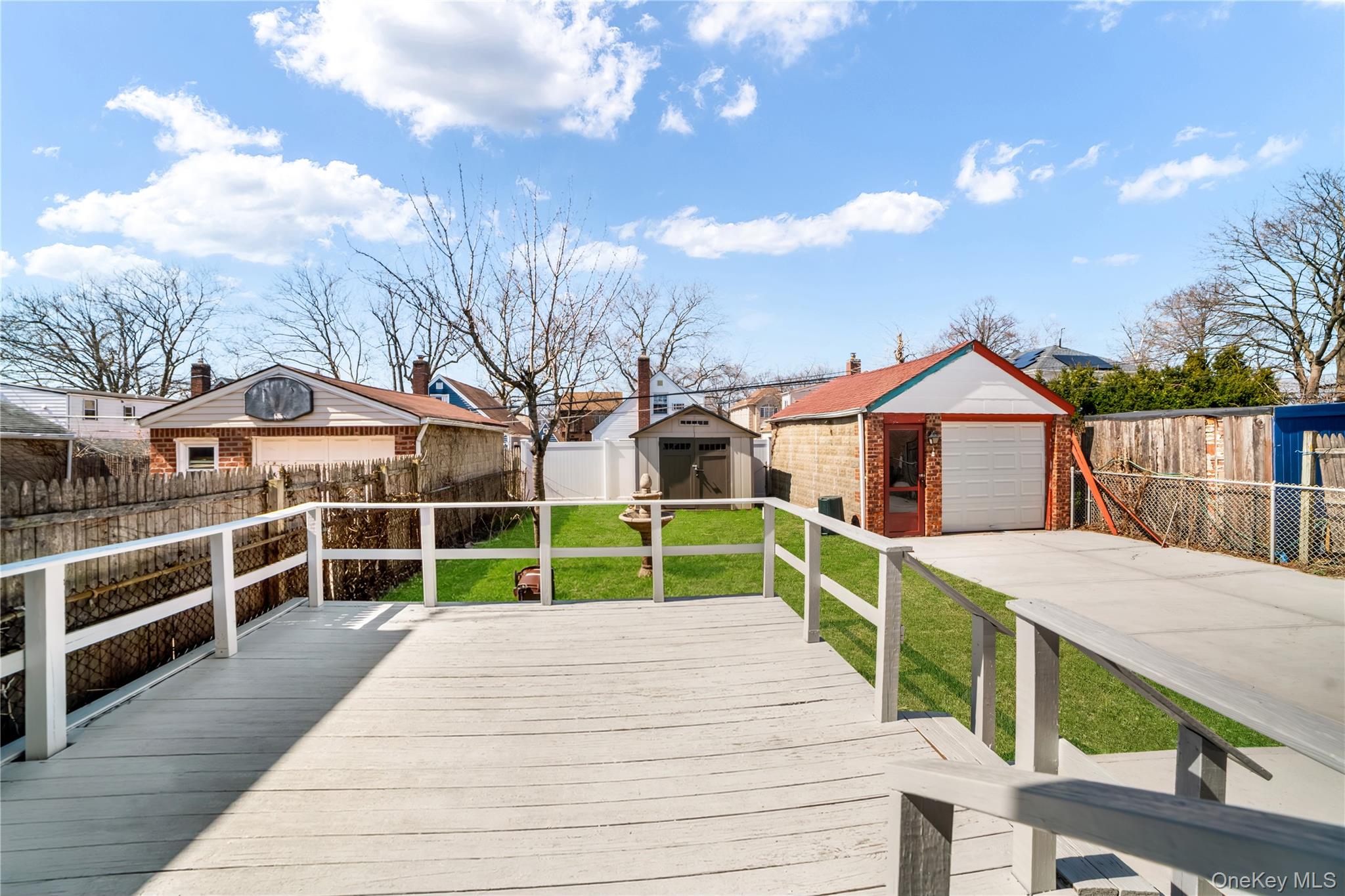 81-28 252nd Street Queens, NY 11426 - Photo 20 of 21 a view of house with deck and entertaining space