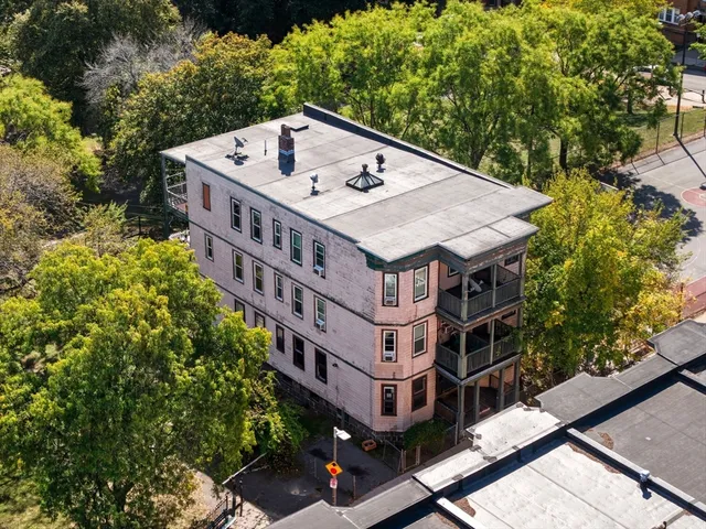 an aerial view of a house with balcony