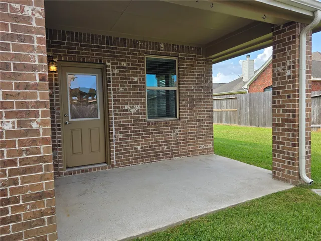 a view of outdoor space and front view of a house