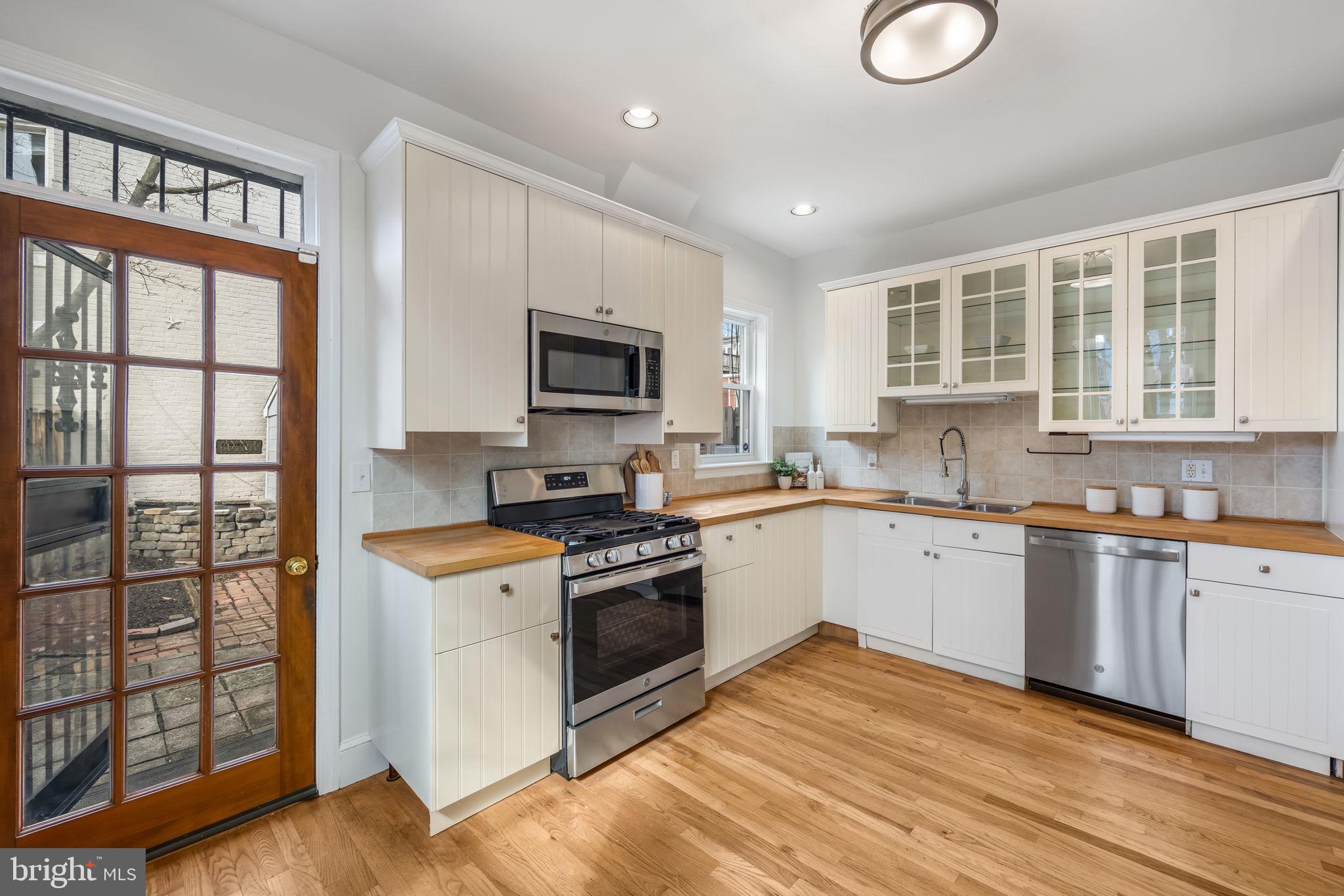 520 14th Street Northeast Washington, DC 20002 - Photo 19 of 44 Spacious, updated, eat-in kitchen opens to patio
