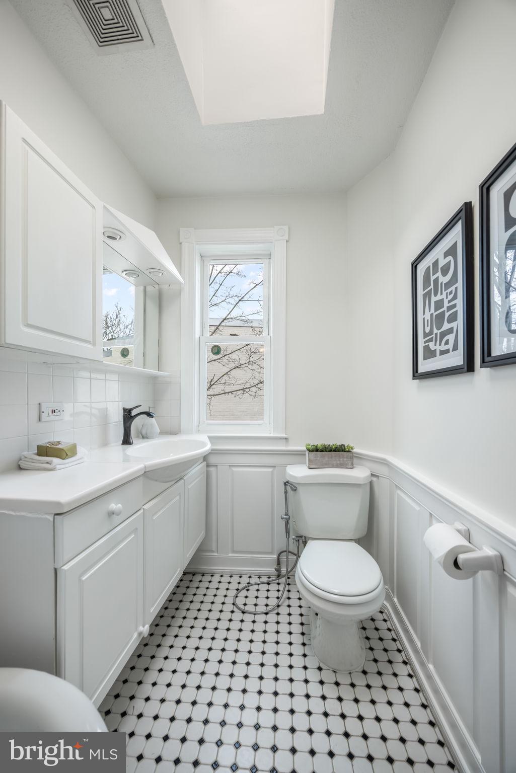 520 14th Street Northeast Washington, DC 20002 - Photo 29 of 44 Upper level hall bath with skylight