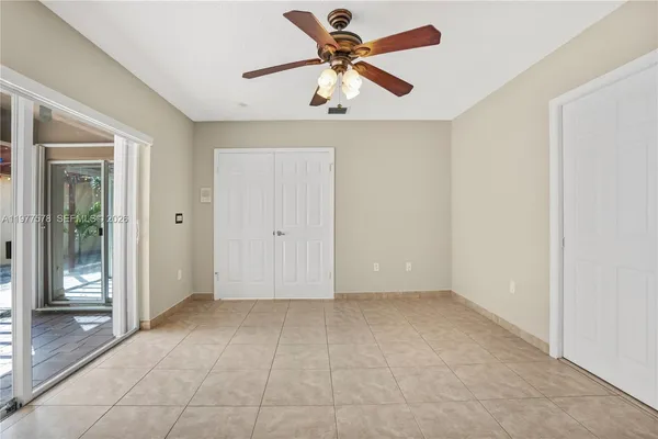 a view of an empty room and window