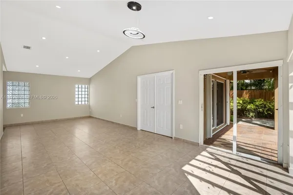an empty room with windows