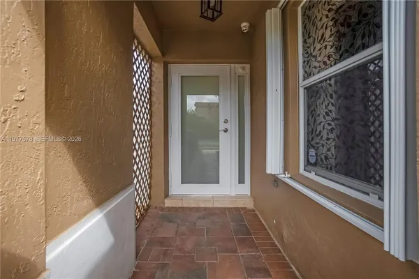 a view of a entryway door of the house