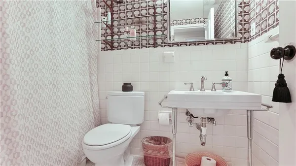 a bathroom with a sink and a toilet