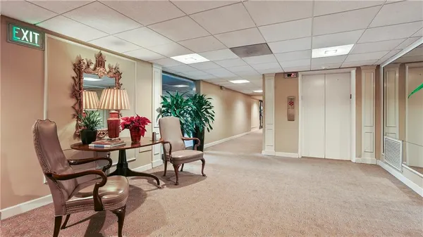 a view of a livingroom with furniture and window