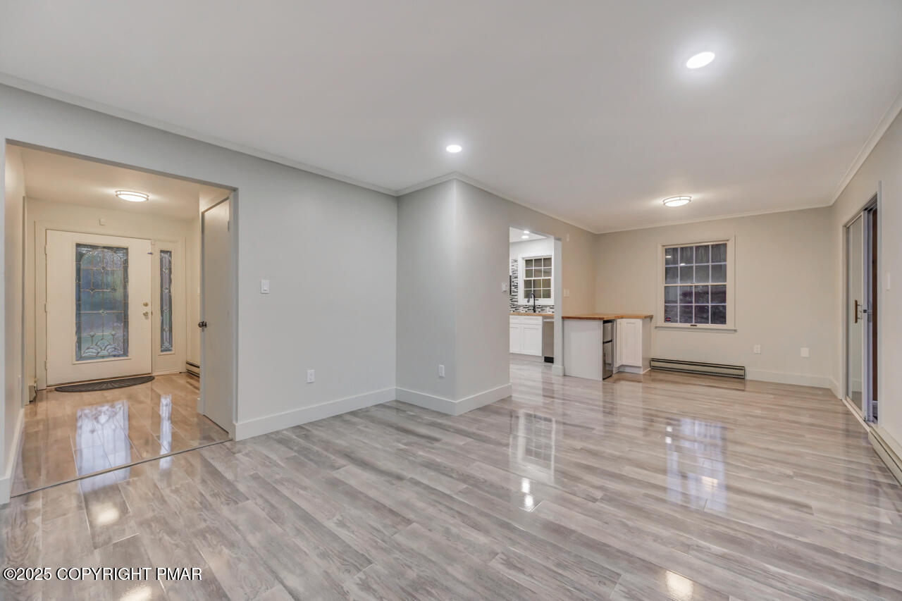 384 Devils Hole Road Cresco, PA 18326 - Photo 12 of 97 a view of empty room with wooden floor