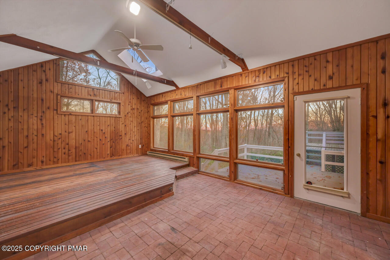 384 Devils Hole Road Cresco, PA 18326 - Photo 29 of 97 a bedroom with a bed and a large window