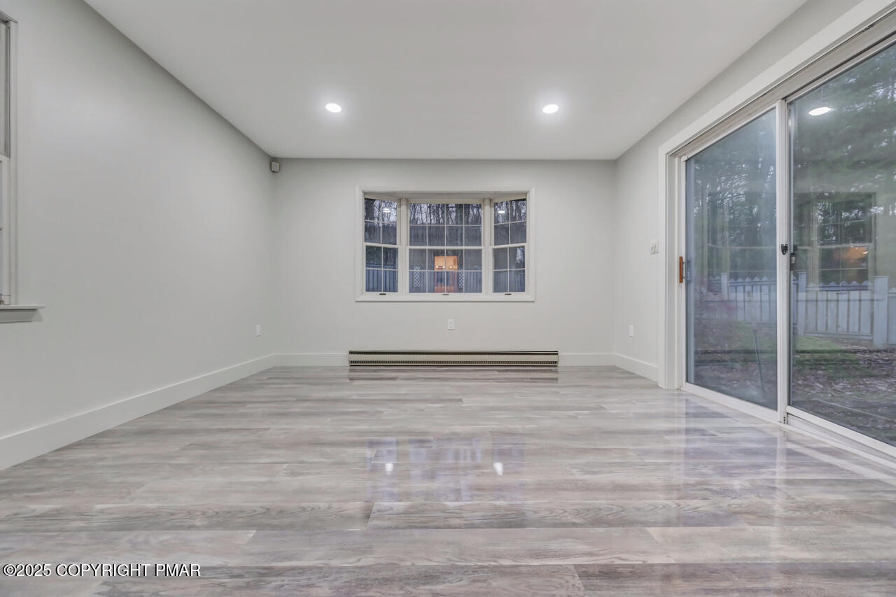 384 Devils Hole Road Cresco, PA 18326 - Photo 38 of 97 a view of an empty room with a window