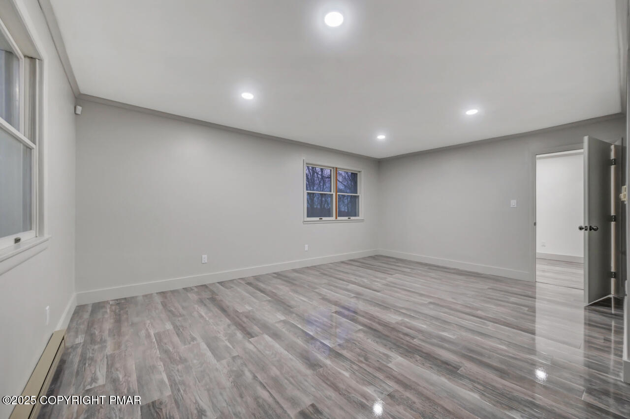 384 Devils Hole Road Cresco, PA 18326 - Photo 58 of 97 a view of empty room with wooden floor