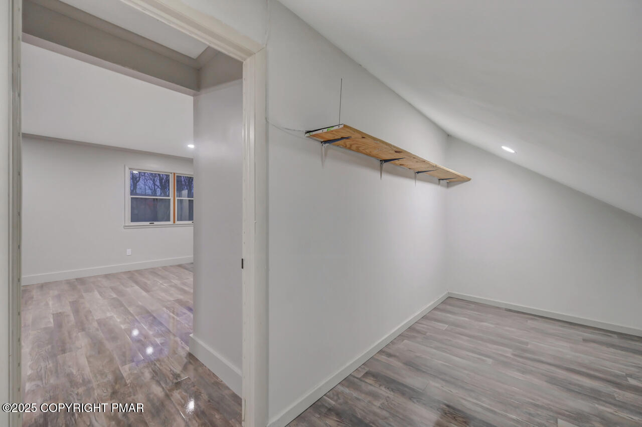 384 Devils Hole Road Cresco, PA 18326 - Photo 61 of 97 a view of empty room with wooden floor