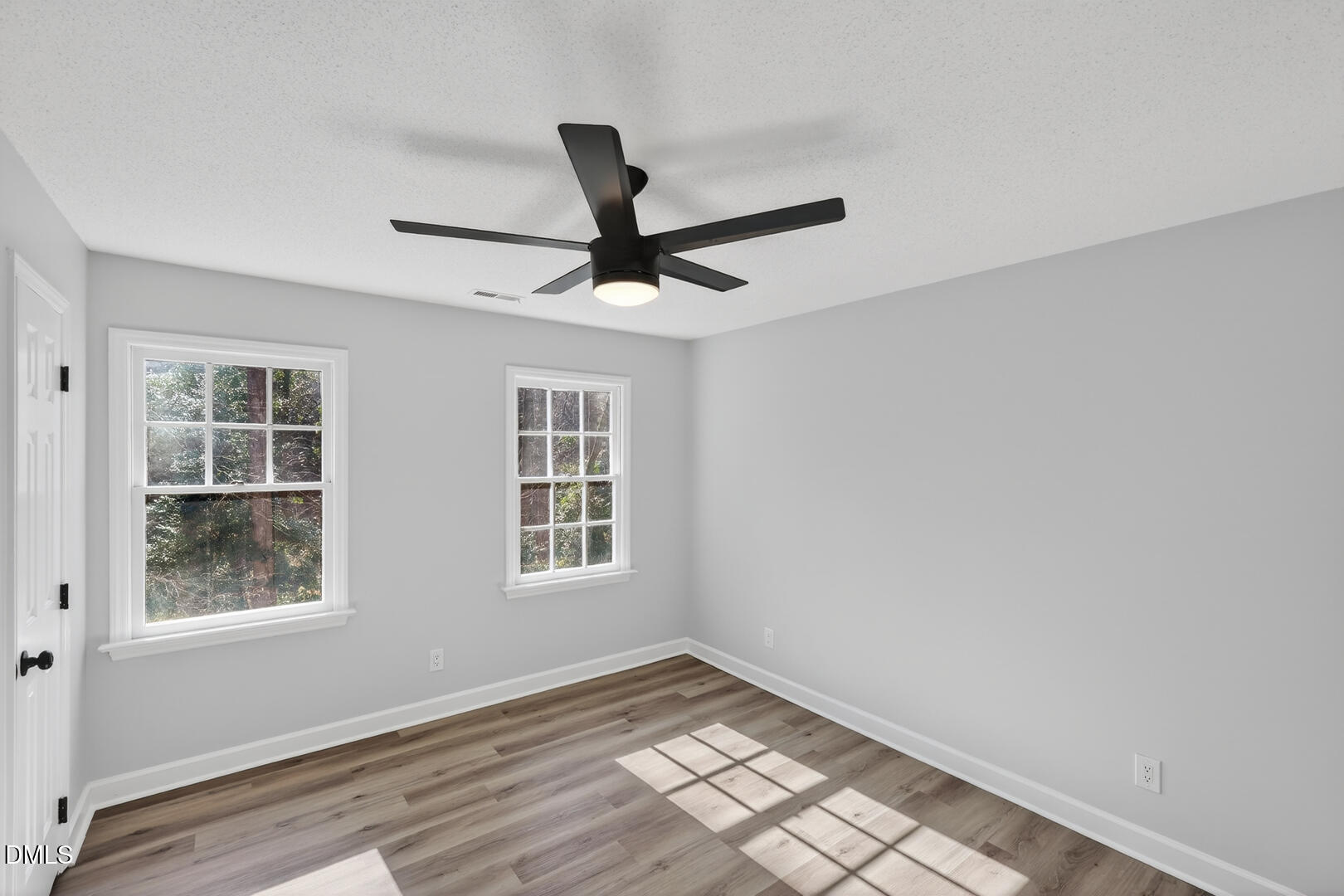 2224 Effingham Circle Raleigh, NC 27615 - Photo 27 of 51 a view of empty room with windows