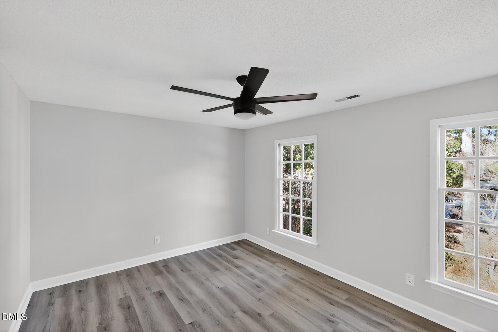 2224 Effingham Circle Raleigh, NC 27615 - Photo 30 of 51 wooden floor in an empty room with a window