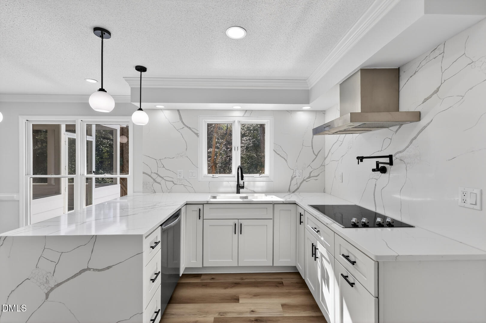 2224 Effingham Circle Raleigh, NC 27615 - Photo 3 of 51 a kitchen with a sink stove and cabinets