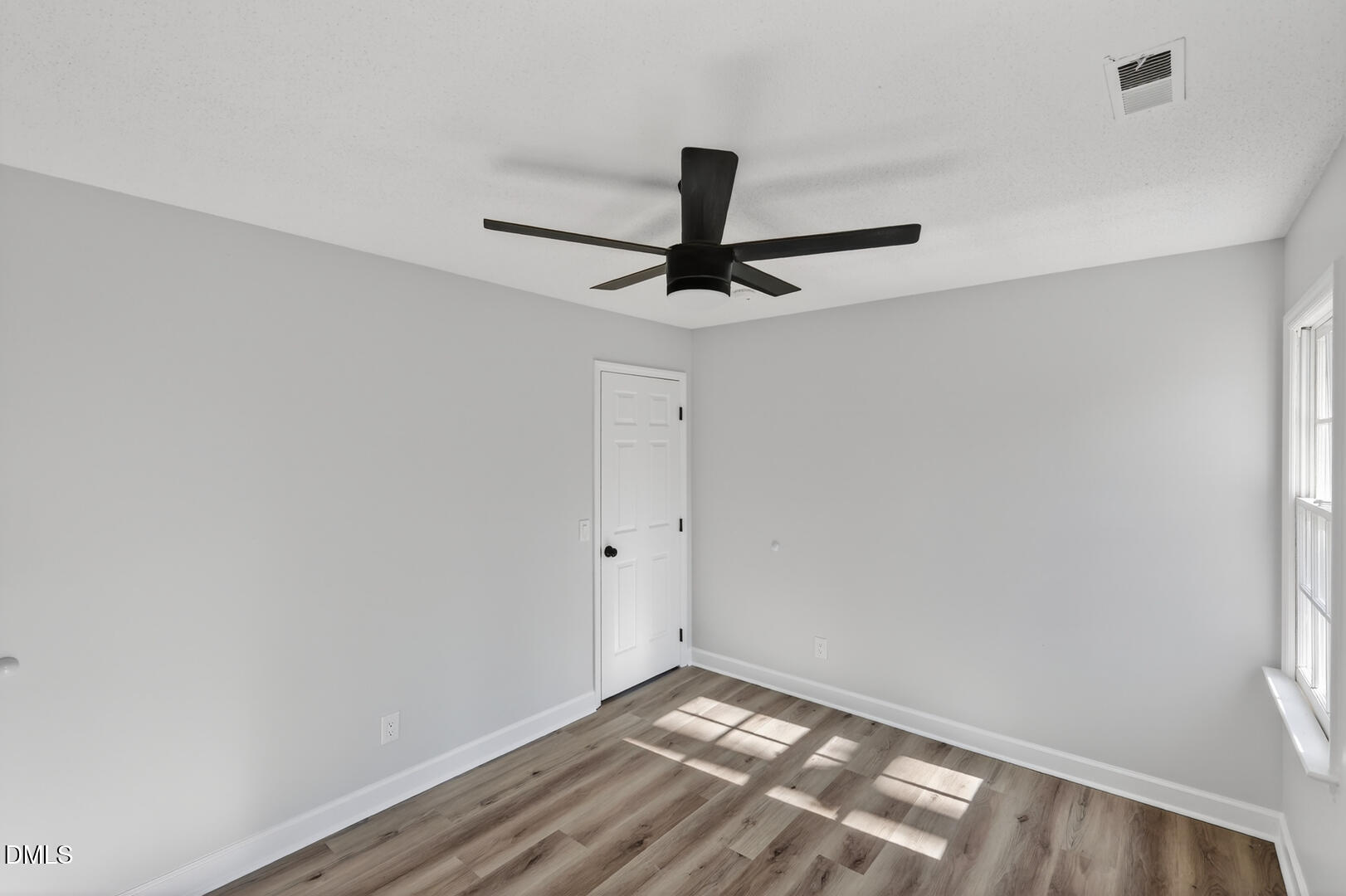 2224 Effingham Circle Raleigh, NC 27615 - Photo 32 of 51 a view of room with window and a ceiling fan