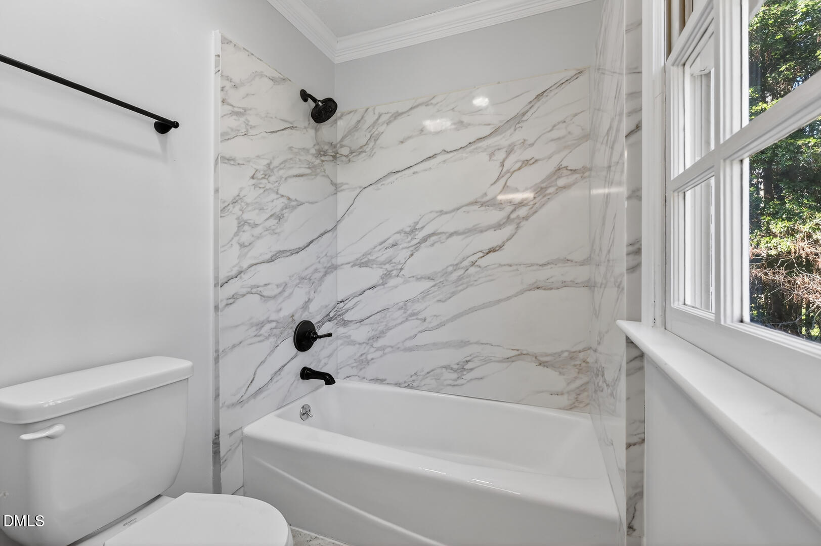 2224 Effingham Circle Raleigh, NC 27615 - Photo 34 of 51 a bathroom with a toilet and a bathtub