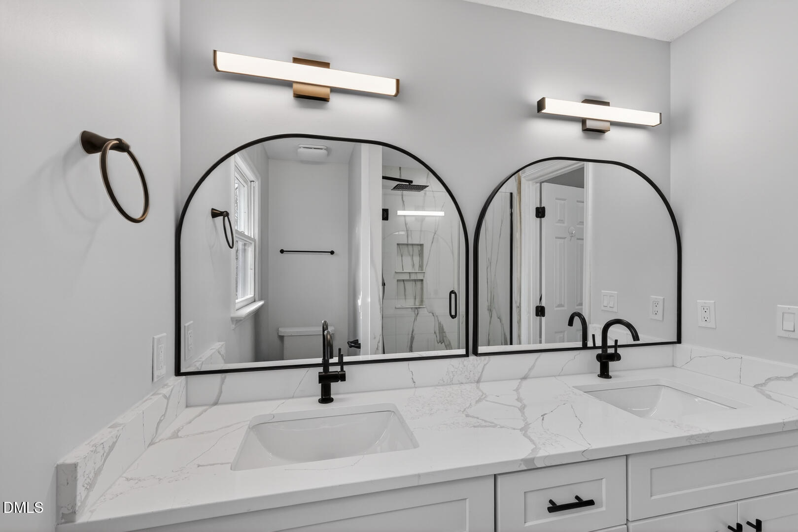 2224 Effingham Circle Raleigh, NC 27615 - Photo 38 of 51 a bathroom with a sink and a mirror