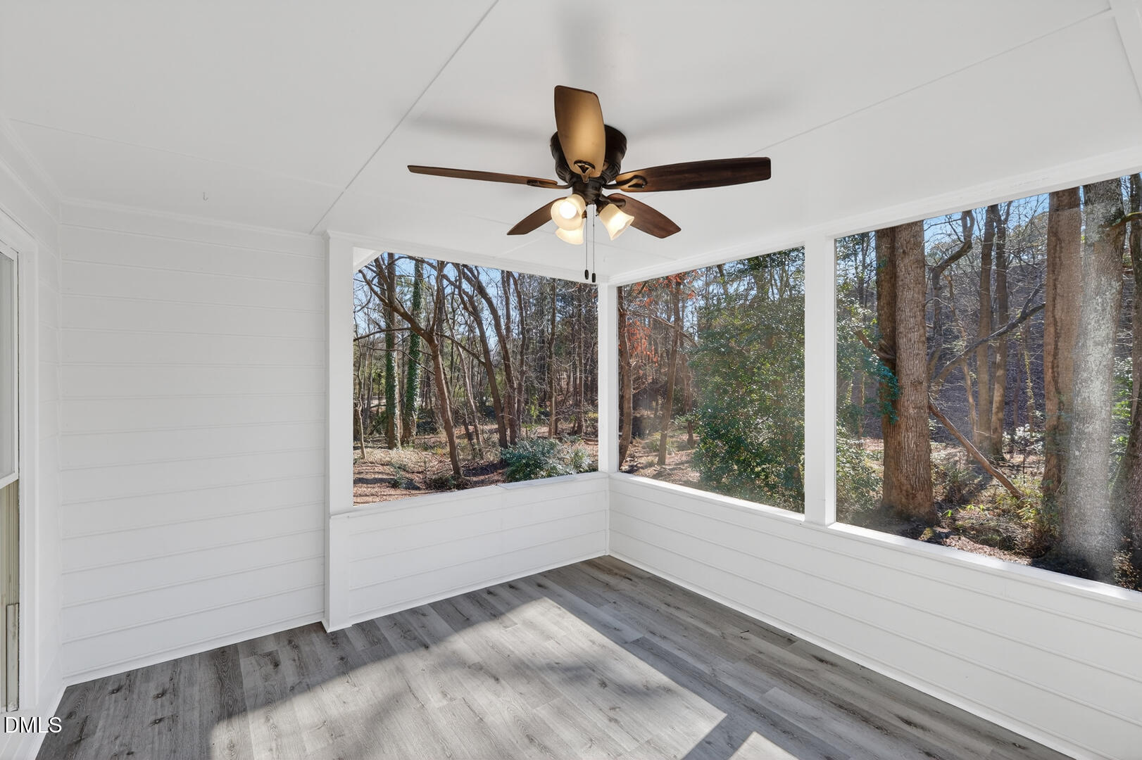 2224 Effingham Circle Raleigh, NC 27615 - Photo 46 of 51 a view of a livingroom with a ceiling fan and window