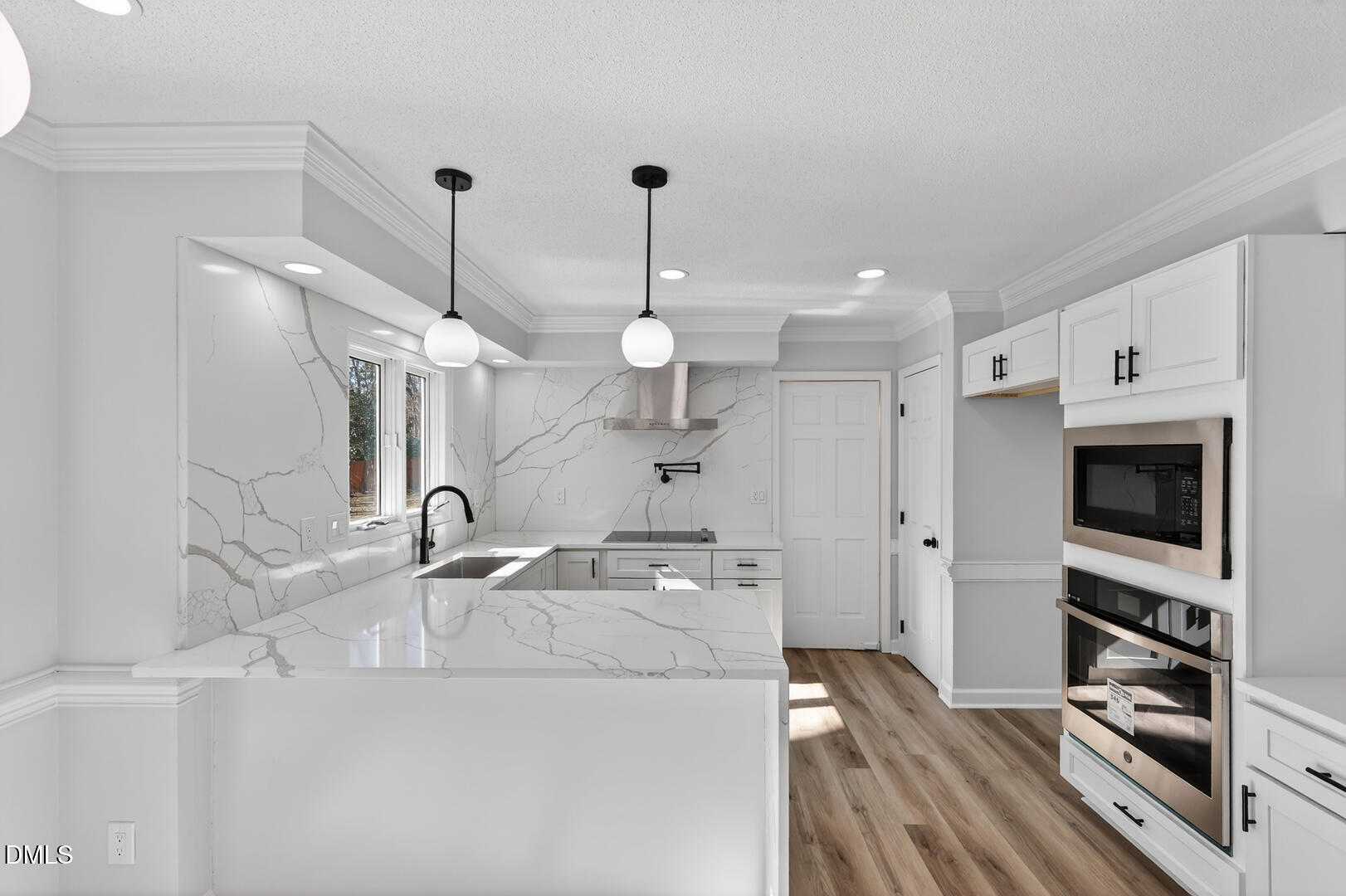 2224 Effingham Circle Raleigh, NC 27615 - Photo 5 of 51 a kitchen with stainless steel appliances granite countertop a sink a stove and a refrigerator