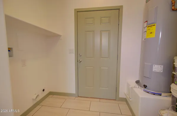 a view of room with window and bathroom