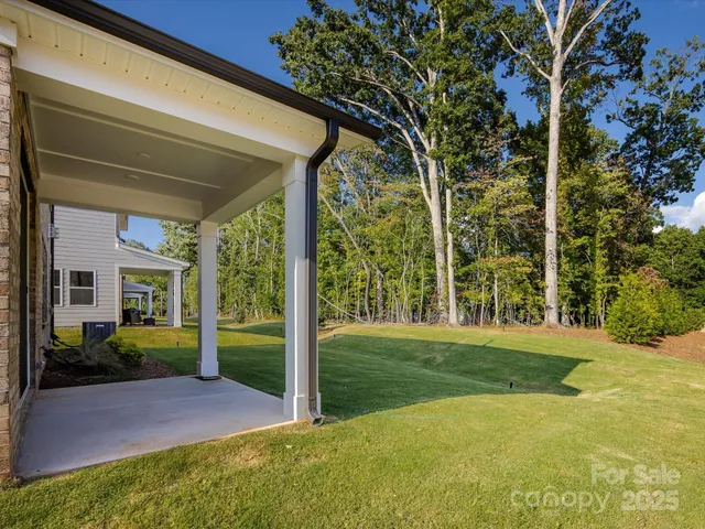 a view of a backyard with garden