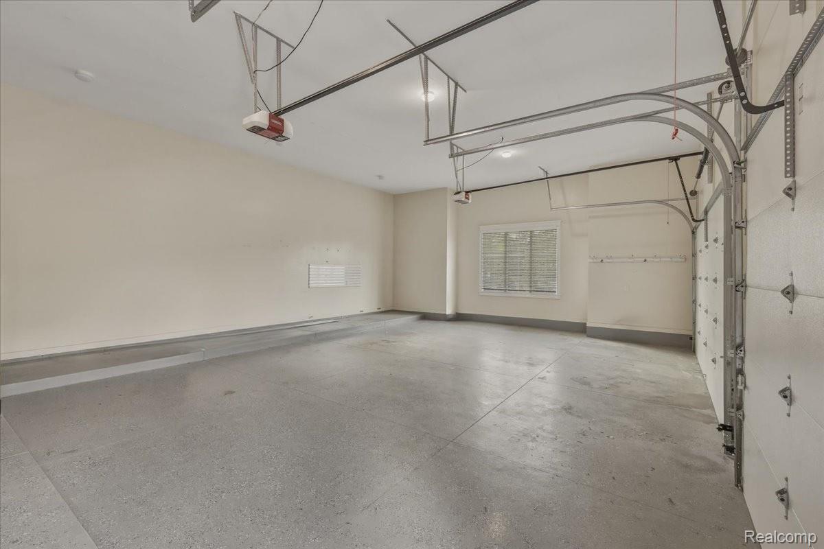 35339 West 13 Mile Road Farmington, MI 48331 - Photo 49 of 72 Oversized Garage with epoxy floors and an attic above