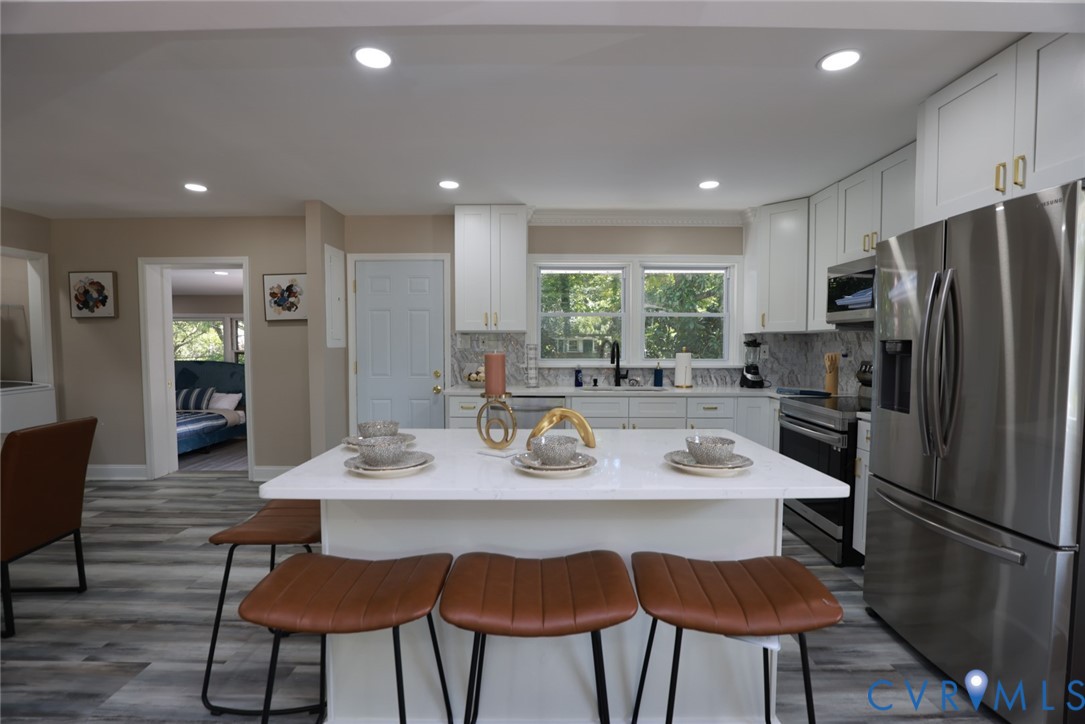 3007 Dunwick Road Richmond, VA 23230 - Photo 5 of 49 Kitchen featuring a center island, recessed lighti