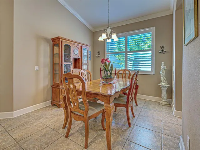 a kitchen with stainless steel appliances granite countertop a sink and a stove