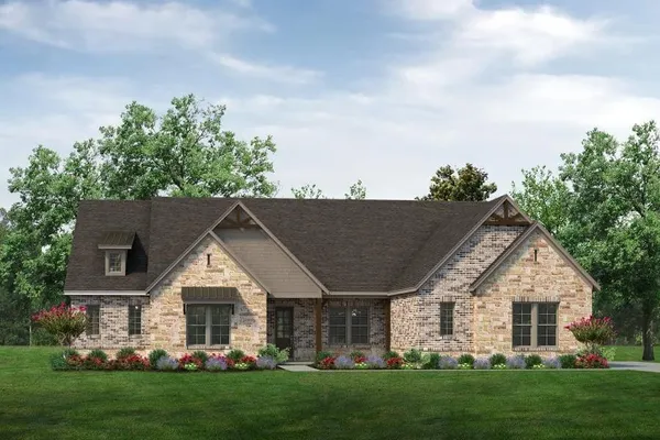 a view of a house next to a yard with big trees