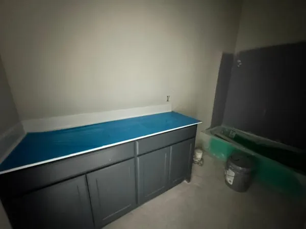 a picture of a bathroom with a sink