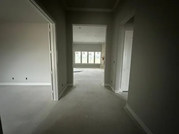 a view of hallway with closet