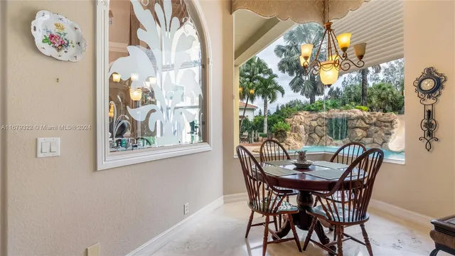 a view of a bathroom with a shower and a toilet