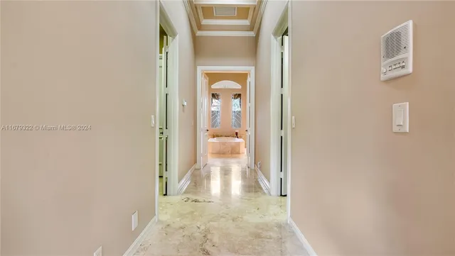 a bathroom with a granite countertop sink toilet a mirror and shower