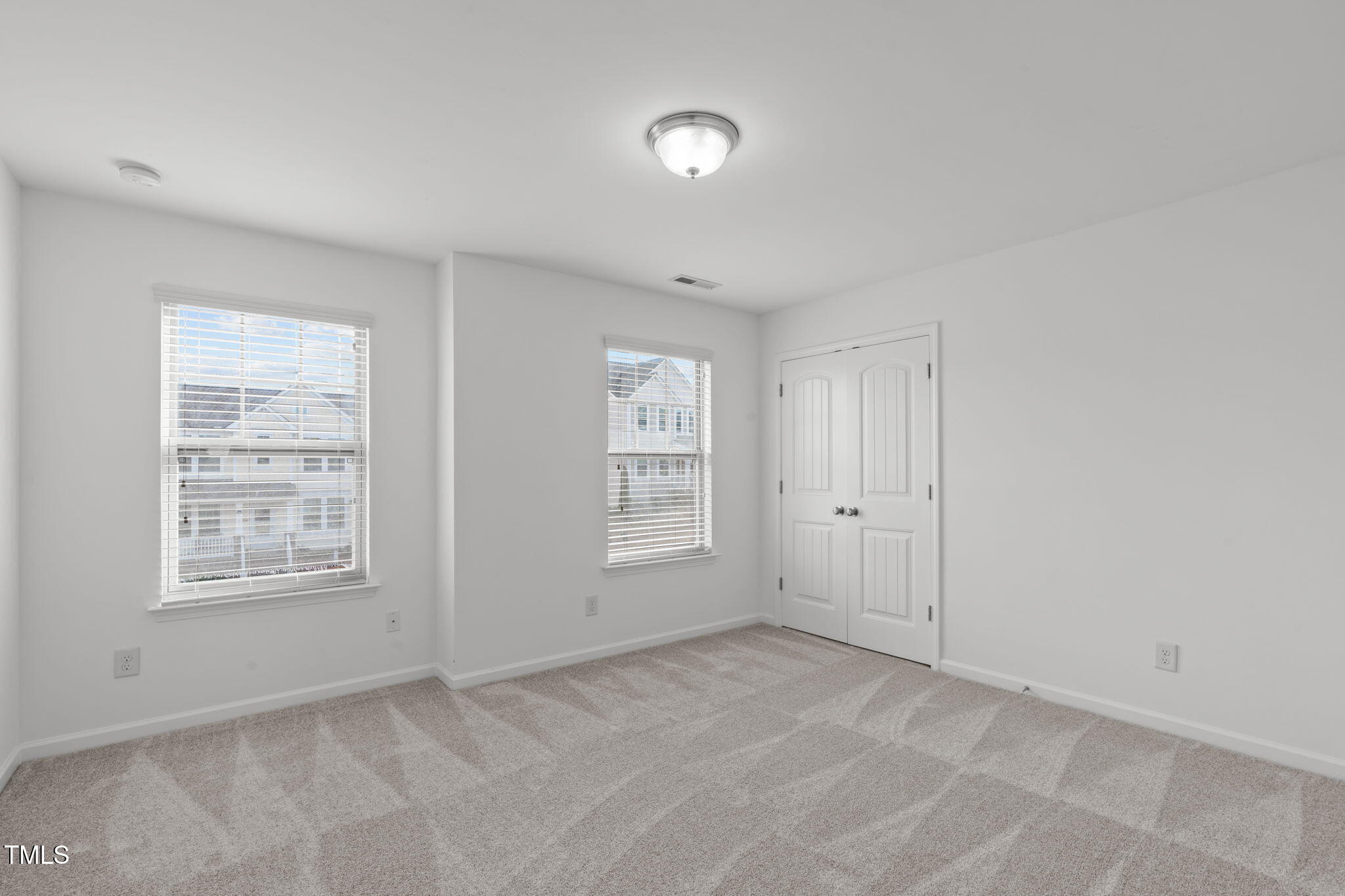 4139 Davis Meadow Street Raleigh, NC 27616 - Photo 25 of 43 a view of an empty room with a window