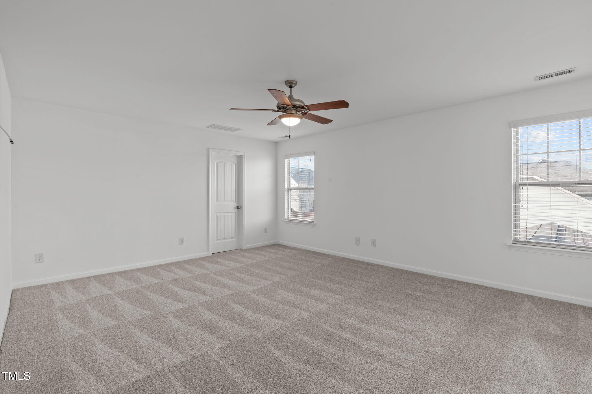 4139 Davis Meadow Street Raleigh, NC 27616 - Photo 30 of 43 wooden floor in an empty room with a window